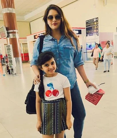 Myra Singh and his mom